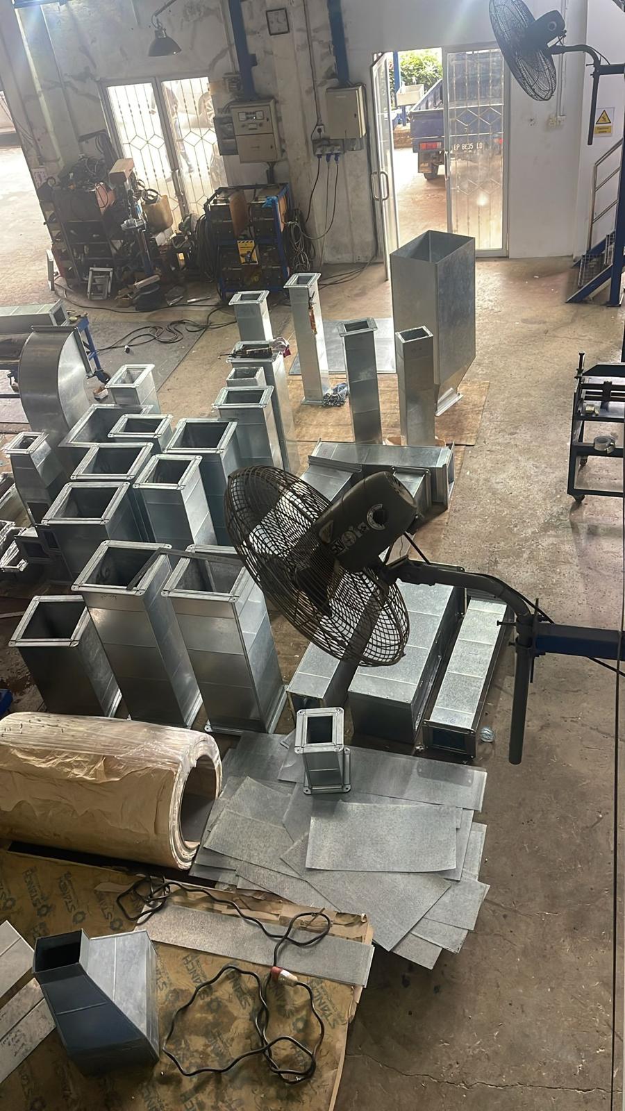 Precision ductwork fabrication process showing high-quality metal ducting components